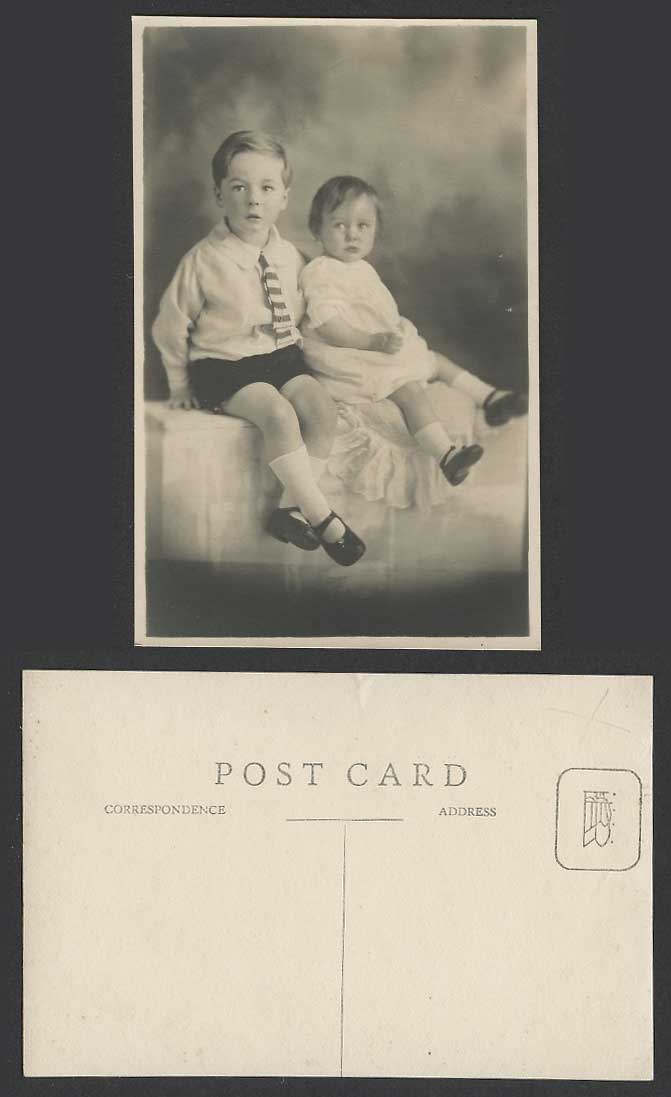 Boy wearing a Tie Little Girl Children Old Real Photo Postcard Photographic Card