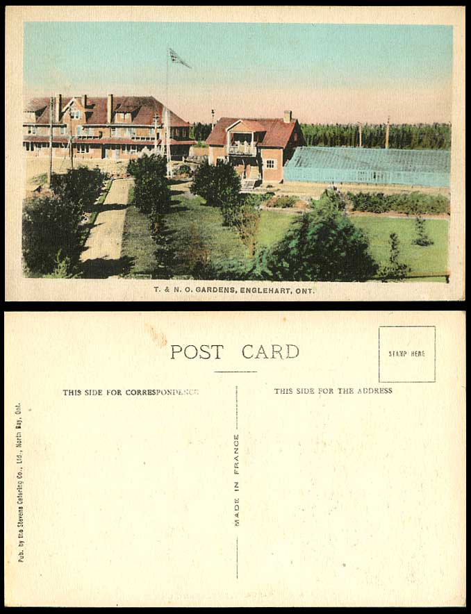 Canada Old Hand Tinted Postcard T. & N. O. Gardens Englehart Flag Street Ontario