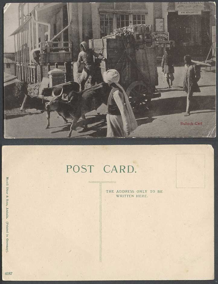 India Old Postcard Double Bullock Cart leaving J.B.&E Wine Samuel Merchants Shop
