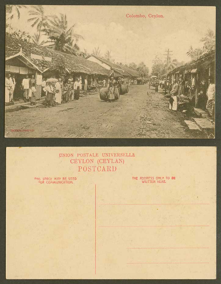 Ceylon Old Postcard Colombo Street Scene, Barrels Native Houses Shops Palm Trees