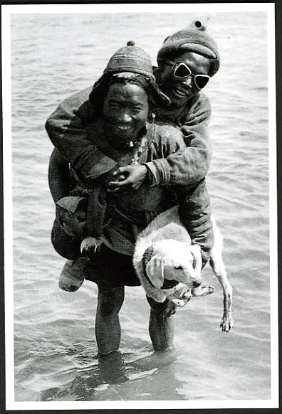 Nepal Mt. EVEREST Expedition 1933 Postcard A NATIVE PORTER Carrying Friend & DOG